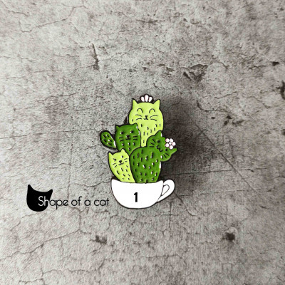 ImagenPin gato cactus